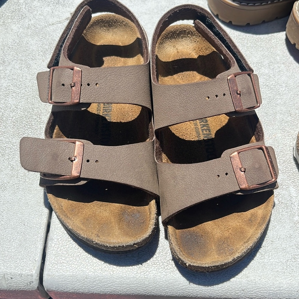 Brown little kid birkenstocks